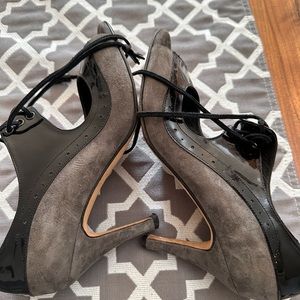 Grey suede and black leather open toe booties. Very chic!